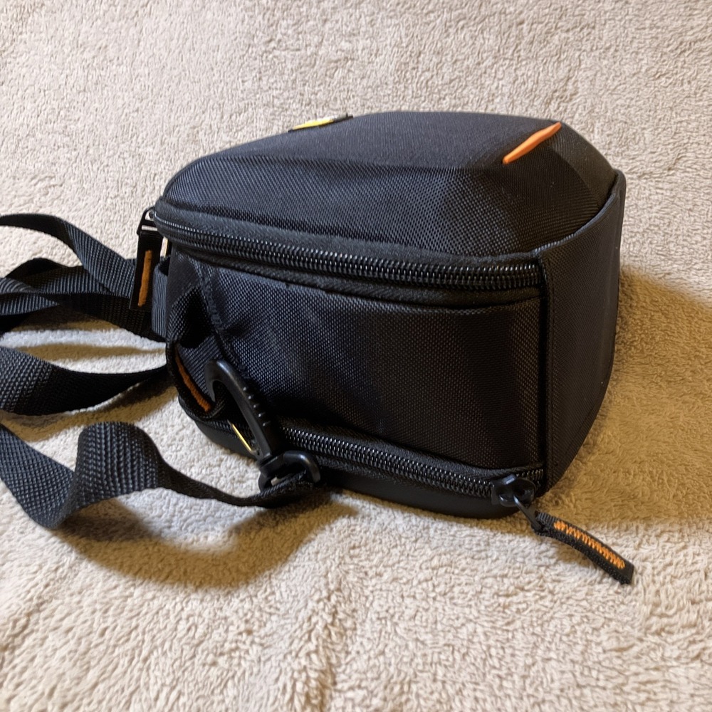Padded Black Camera Case with Orange Accent and Adjustable Strap